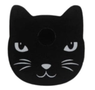 Black cat-shaped object with white accents on a white background