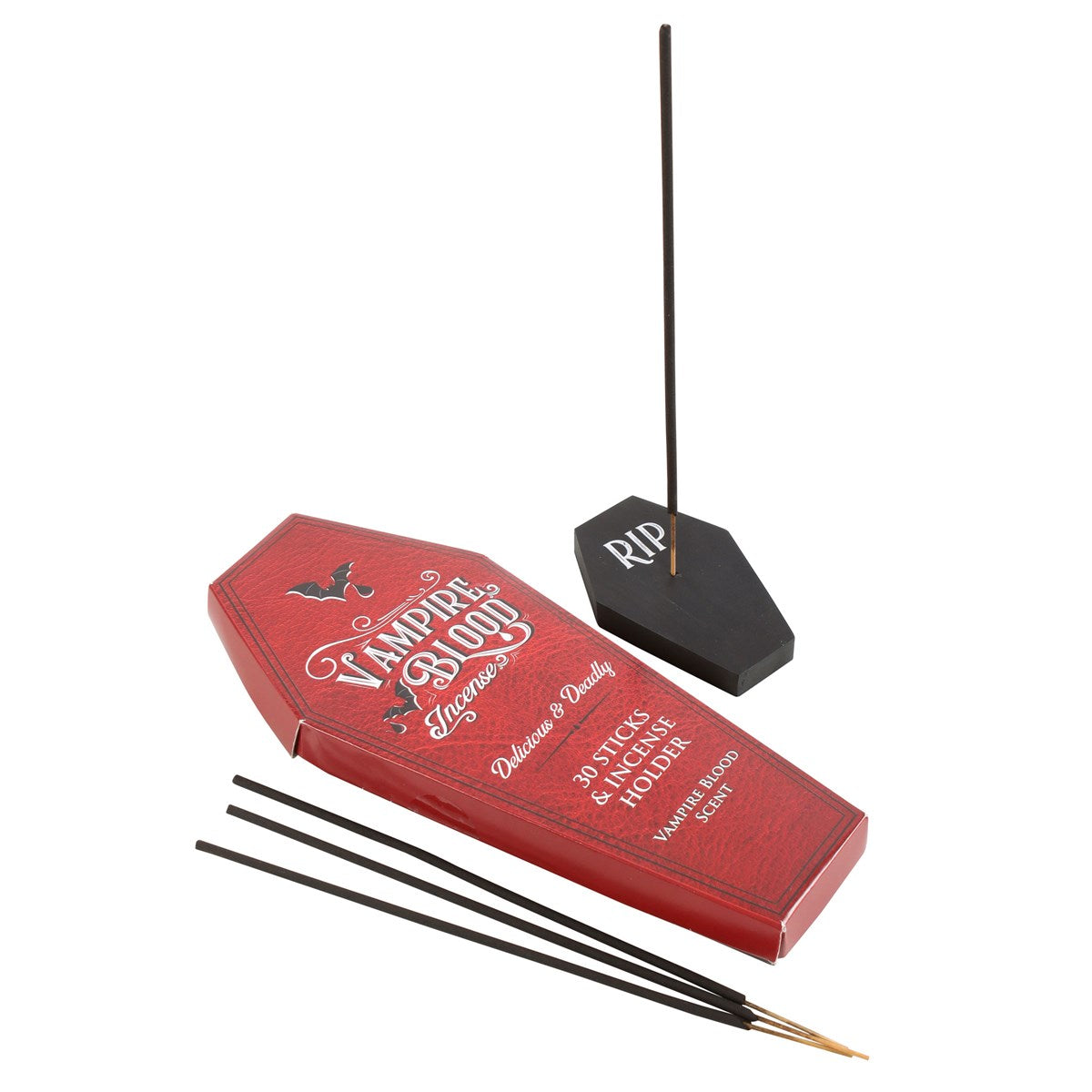 Red coffin-shaped box with incense sticks and holder on a white background