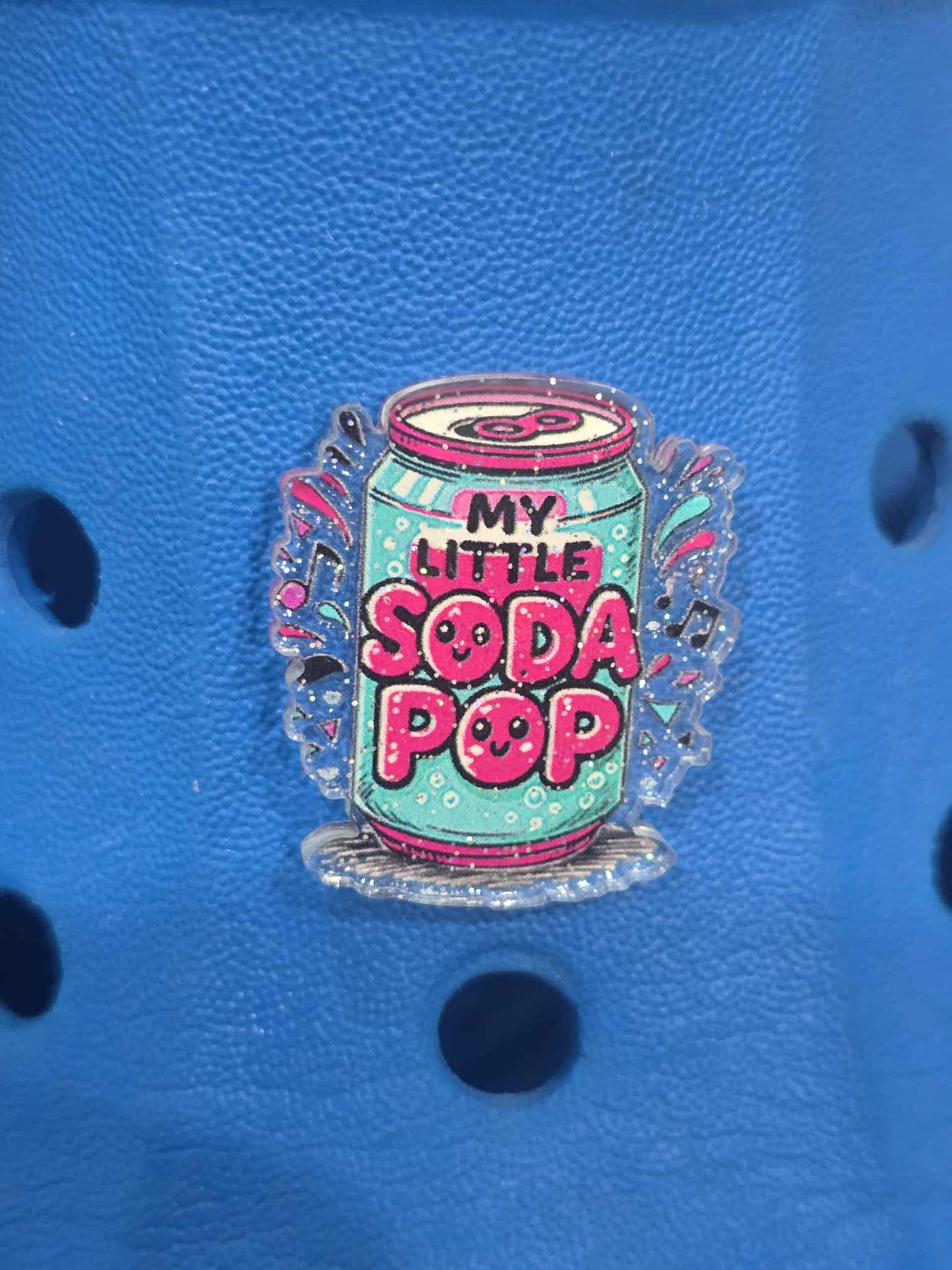Pin with 'My Little Soda Pop' design on a blue background