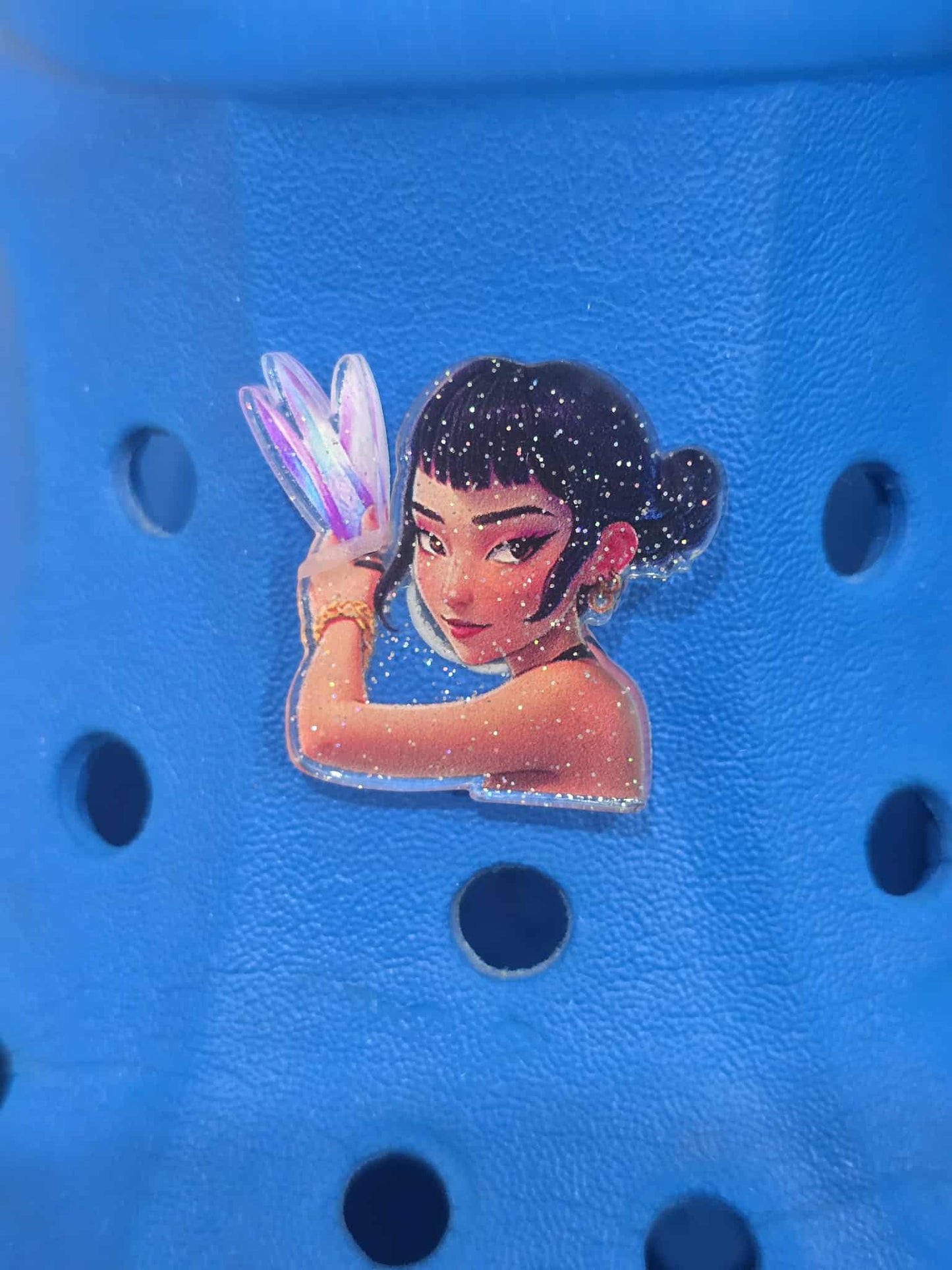 Blue shoe with a character holding flowers sticker