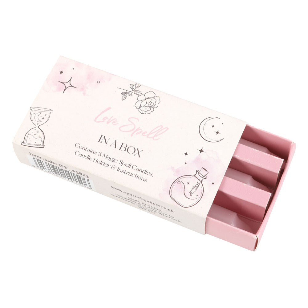 Pink candle holder with packaging labeled 'Little Spells' on a white background