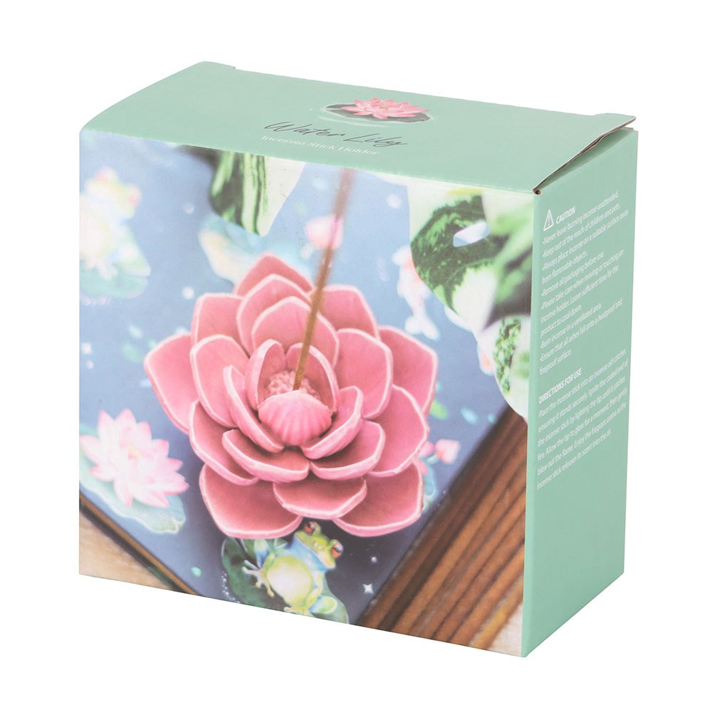Product packaging with a pink floral design on a light green background