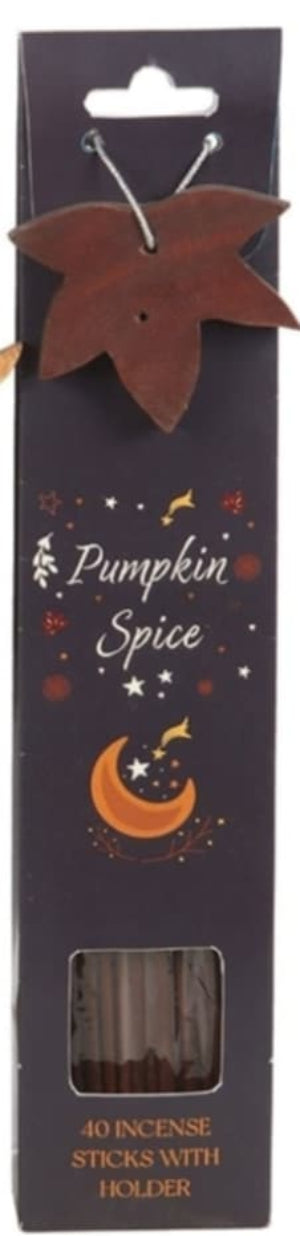 Pumpkin spice incense sticks with holder packaging on a dark background