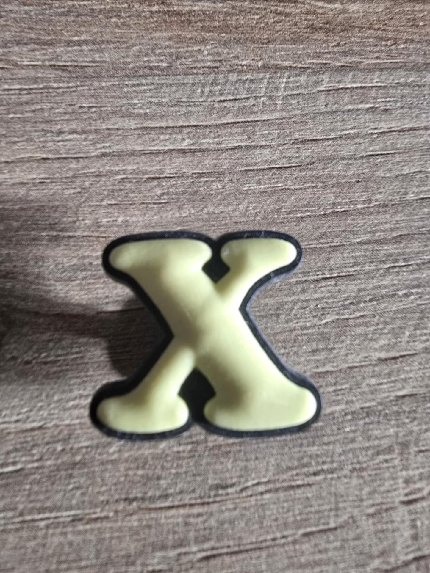 X Charm