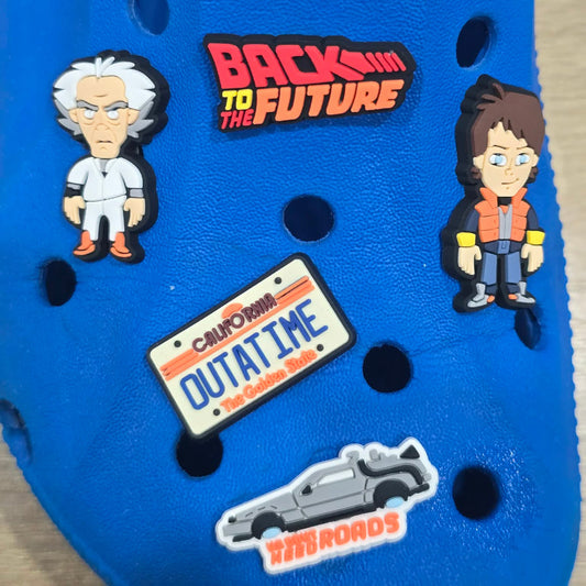 Blue sandal with 'Back to the Future' themed decorations including characters and a license plate.