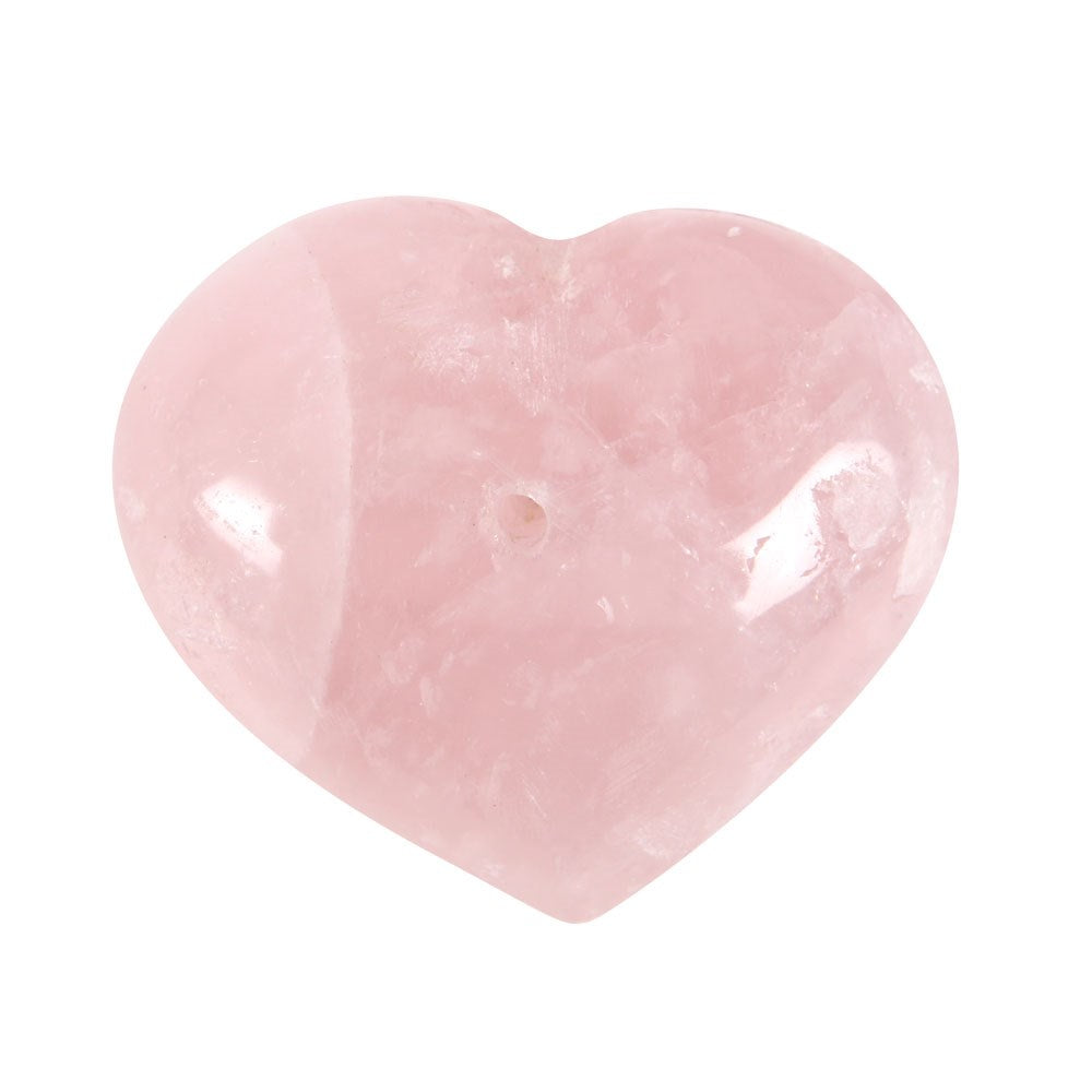 Heart-shaped pink stone on a white background