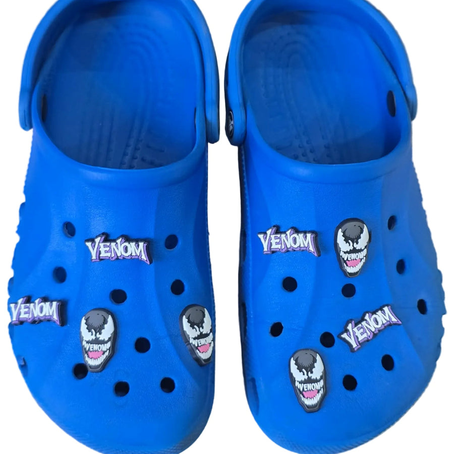Blue clogs with Venom-themed designs on a wooden surface
